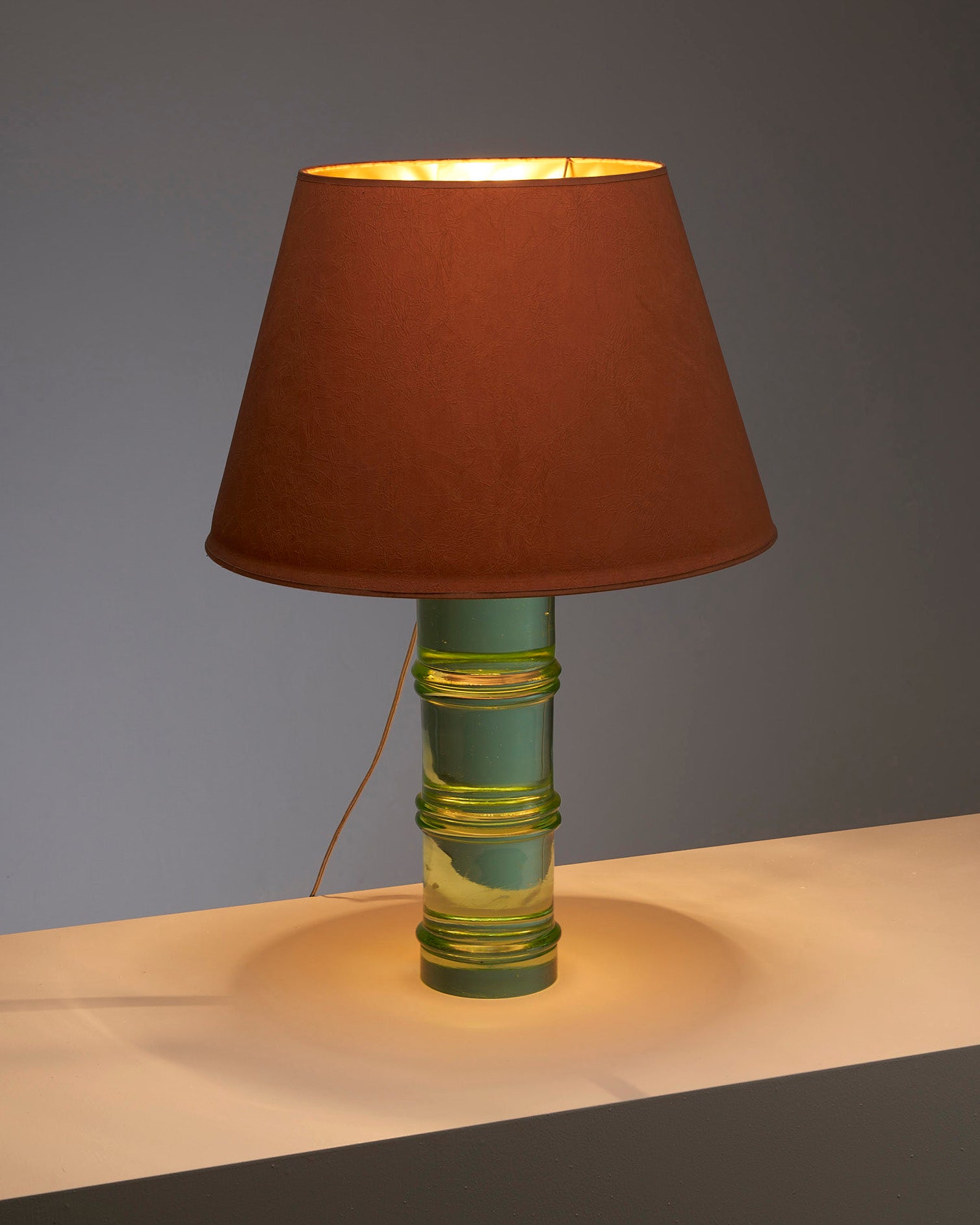 Solid glass table lamp with orange lampshade in the manner of Fontana Arte or Venini