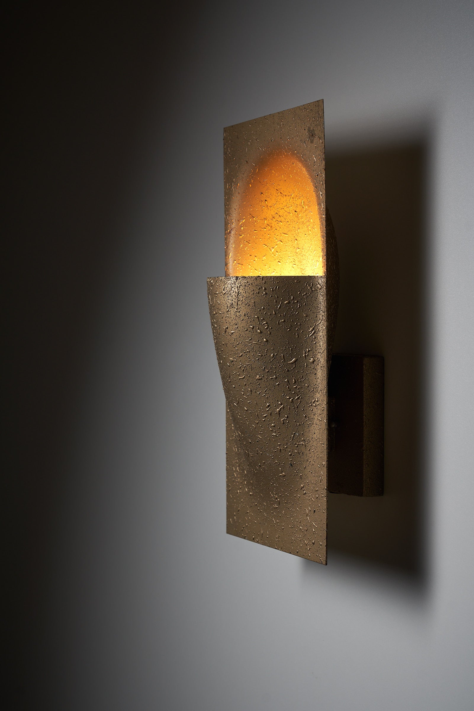 Elegant "Balance C-1551" wall lamp by Bertrand Balas with organic shape inside rectangular frame, emits warm light.