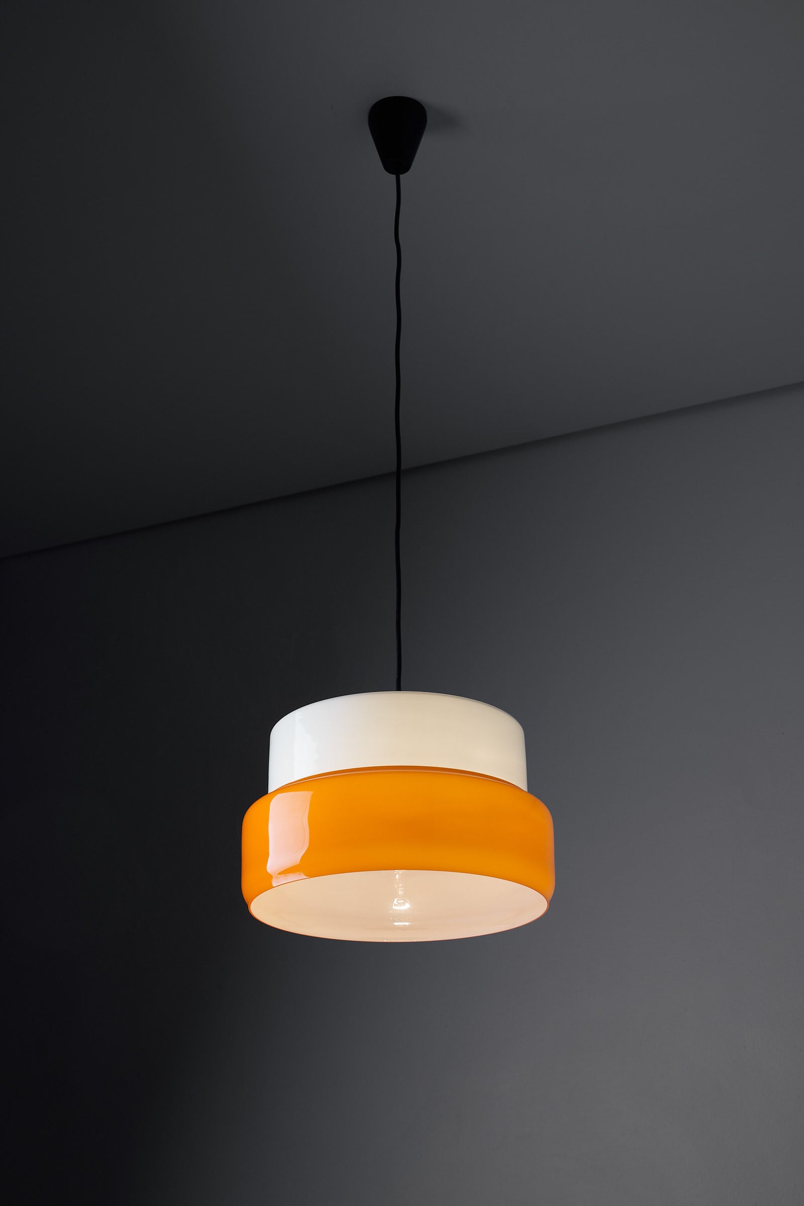 Pendant Lamp by the brand Vistosi from Italy, Lamp in Orange in Opal Murano glass.
