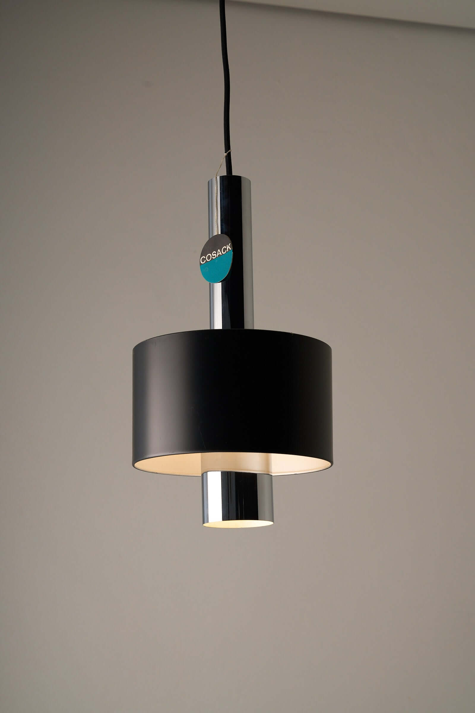 Vintage Cosack black pendant lamp with chrome inner frame from the 1960s, showcasing sleek mid-century industrial design.