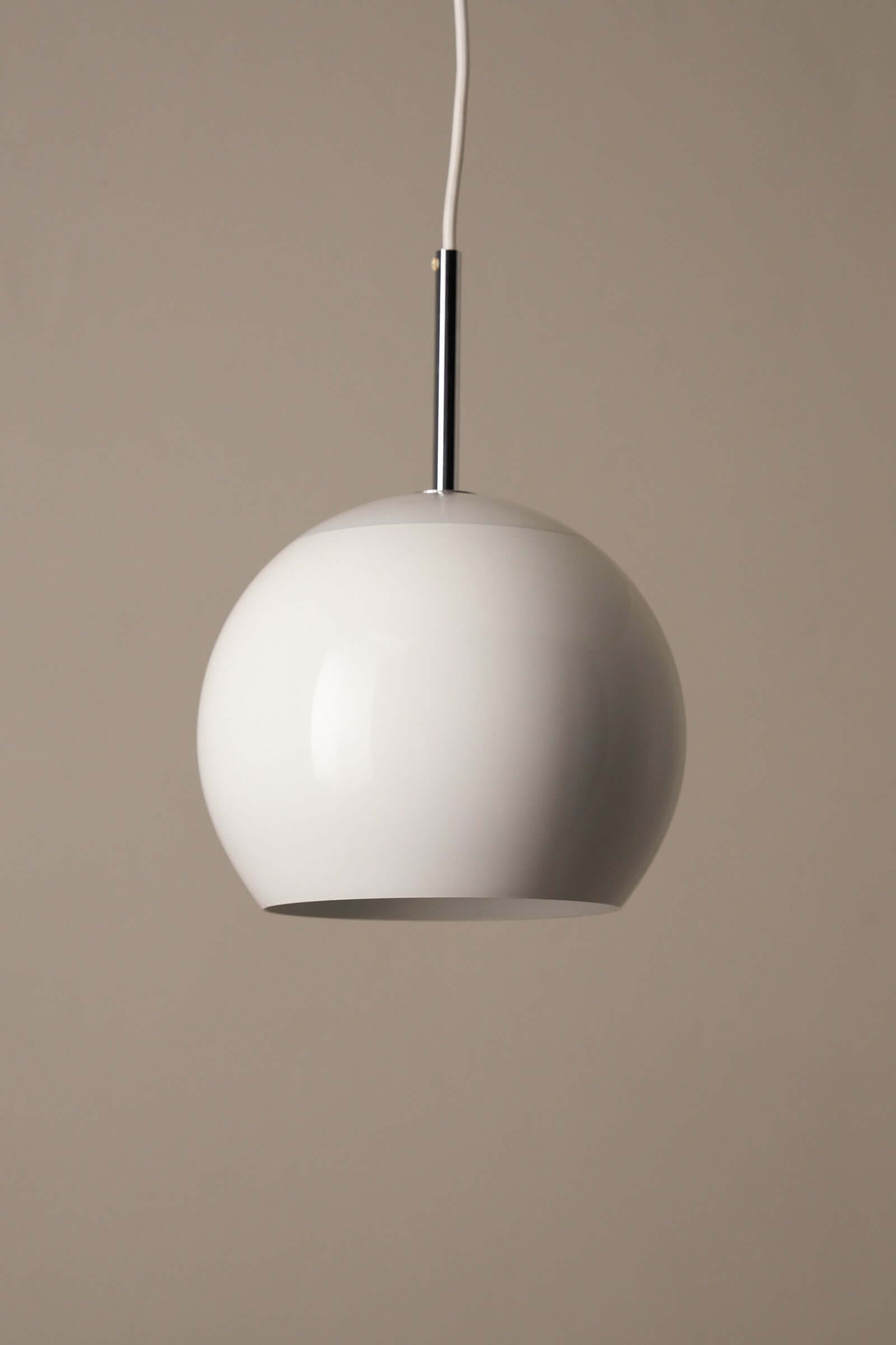 Elegant white sphere pendant lamp by Cosack with chrome stem, showcasing mid-century German craftsmanship.