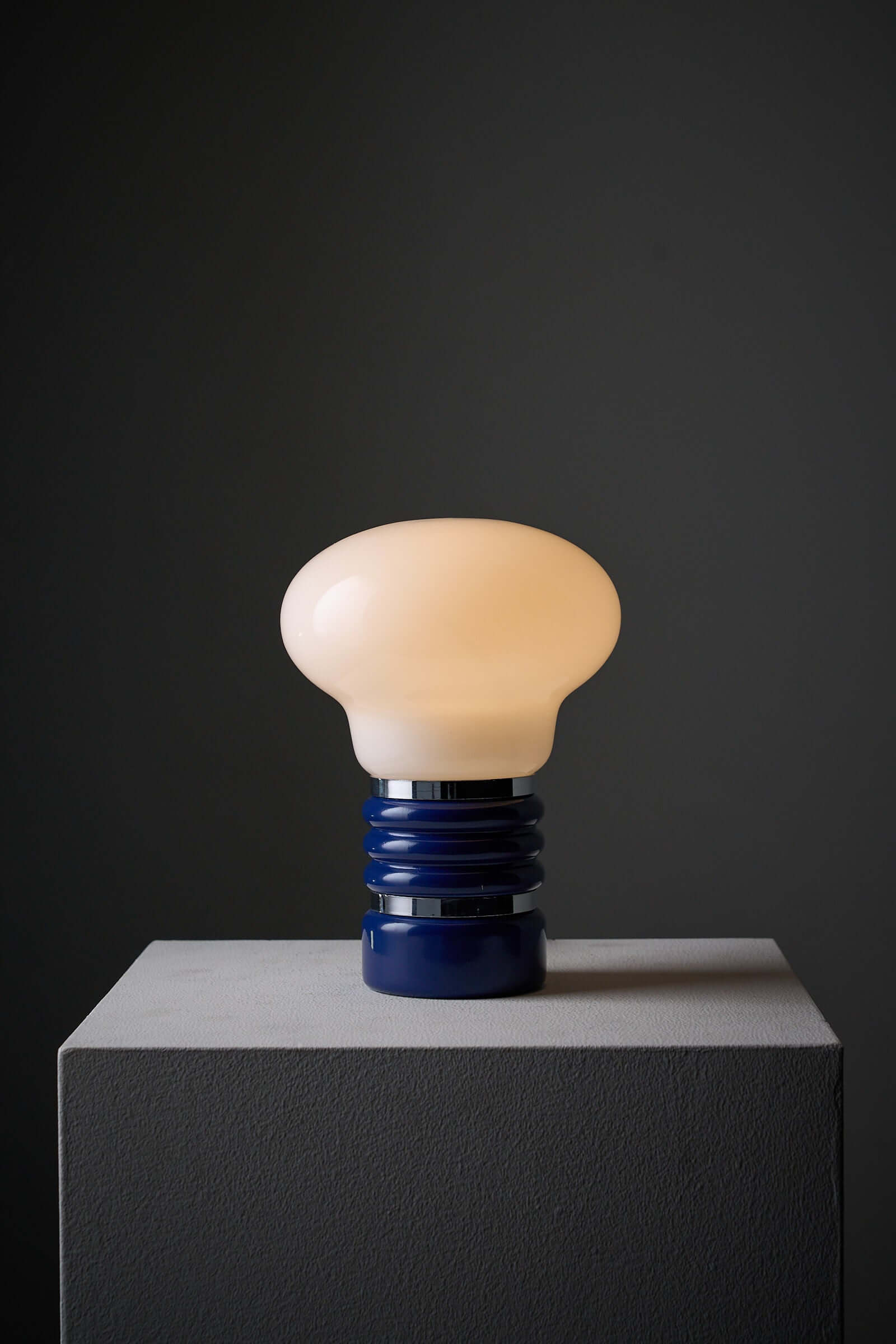 Enrico Tronconi blue lacquer table lamp with opal glass shade, showcasing modern Italian design and playful elegance.